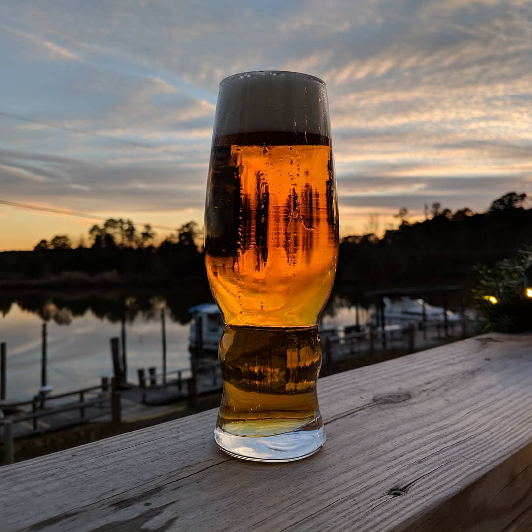 Billsburg brewery fly away spa sunset on the deck at the marina in James city county williamsburg virginia